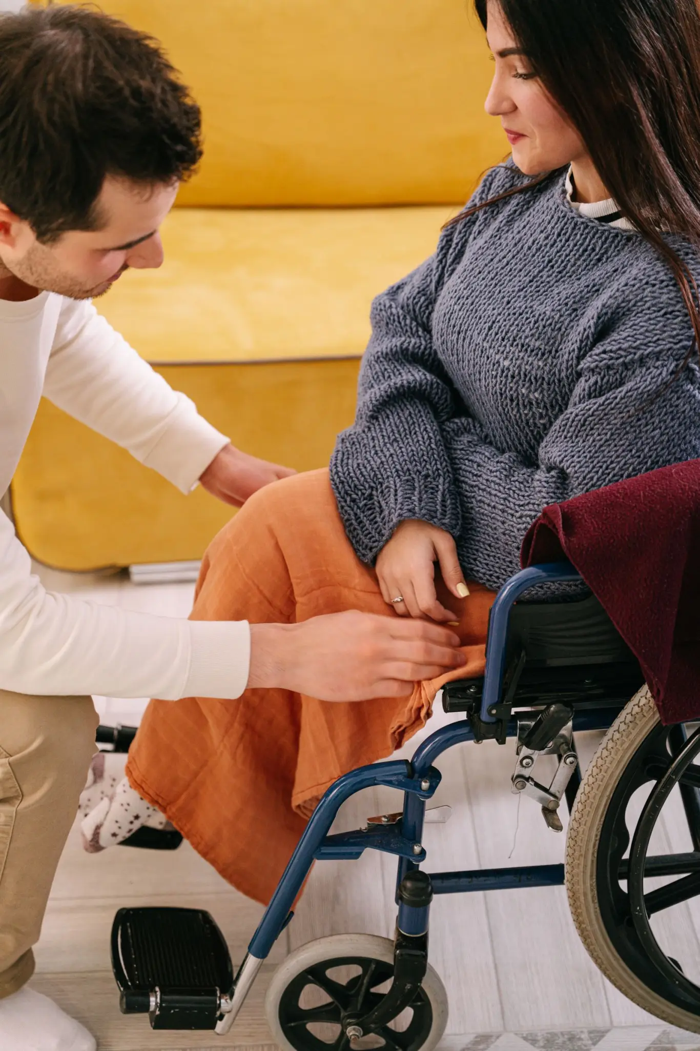 A support worker and a participant together outdoors